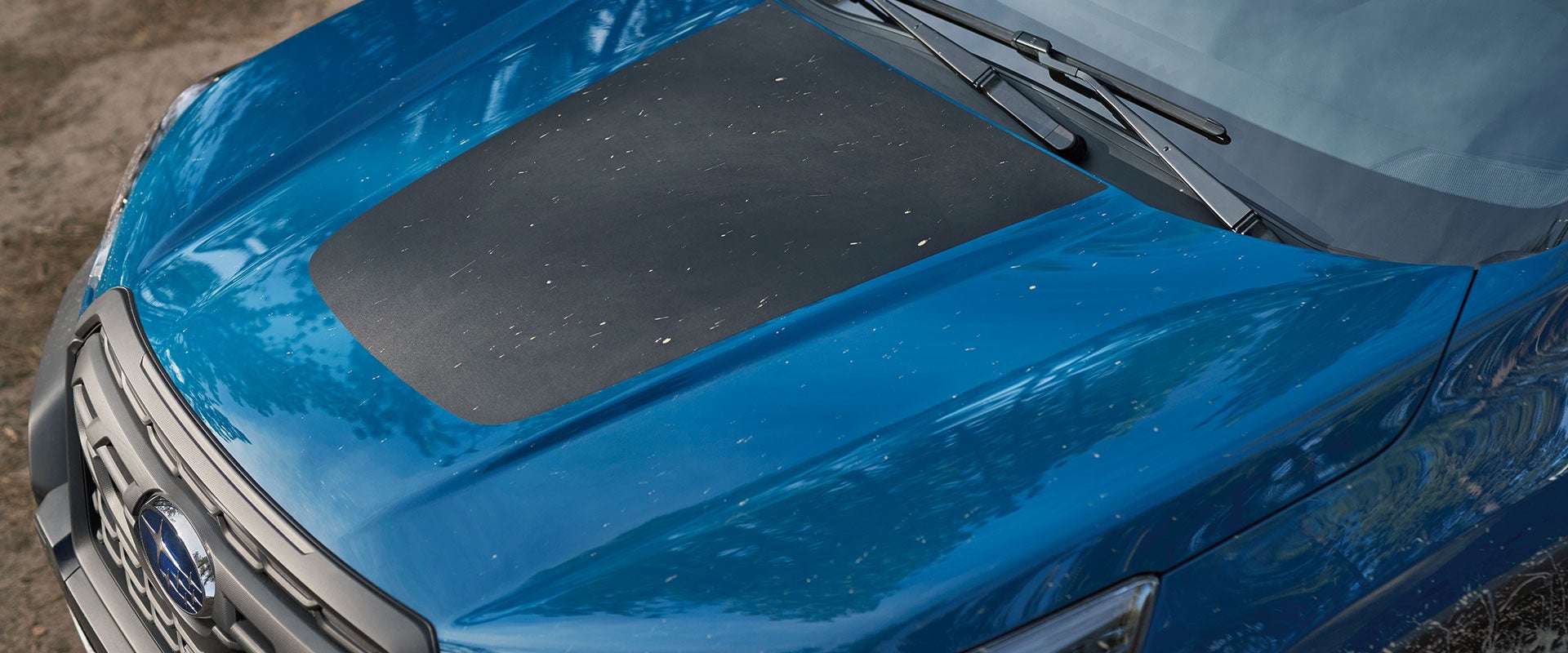 Glare-reducing hood decal